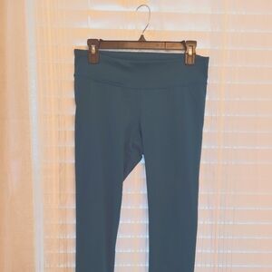 EUC women's Under Armour teal leggings size M. $14